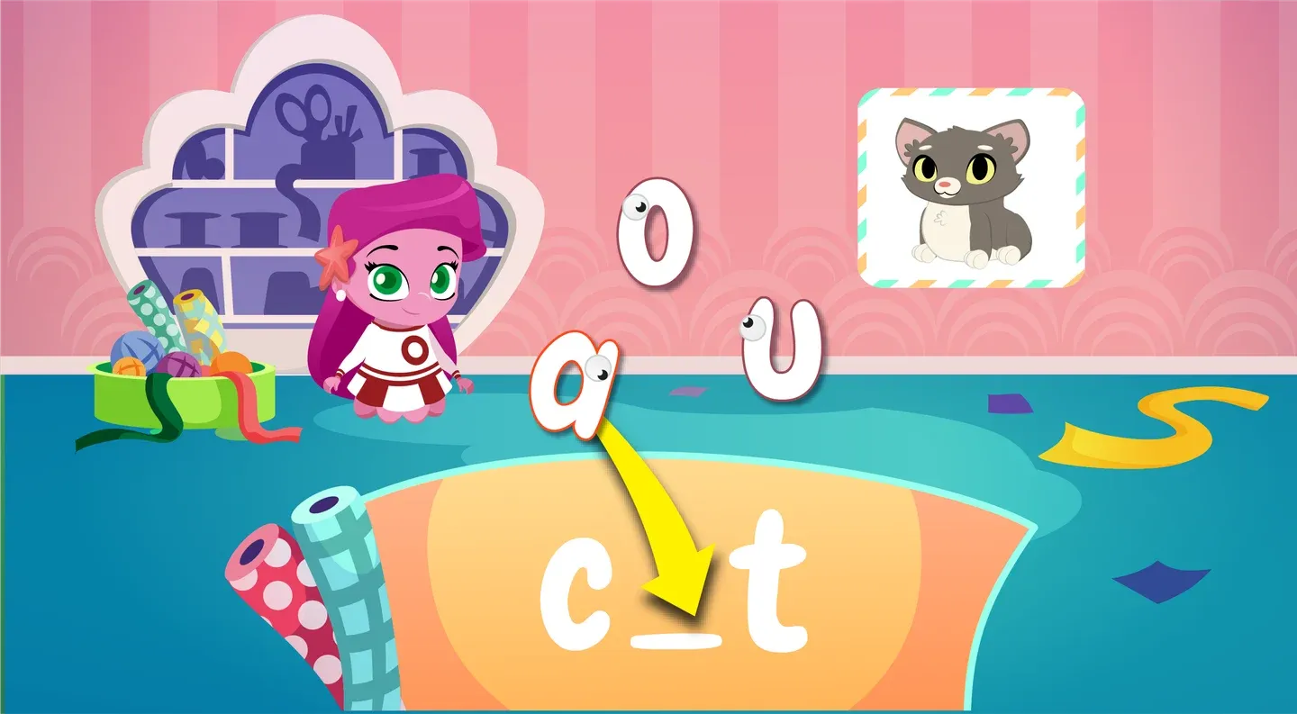Wonster Words phonics game: building the word “cat” by choosing the missing vowel sound.
